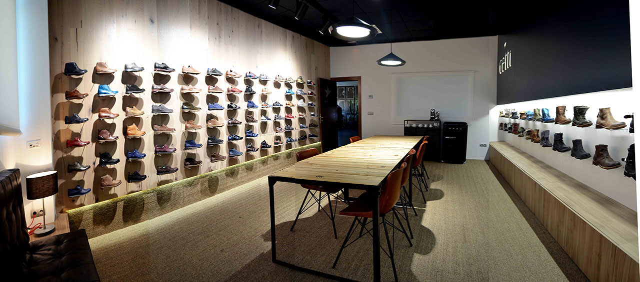Diseño de Showroom de calzado estilo industrial
